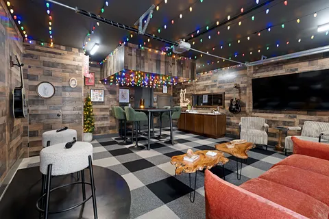 a couple of table and chairs in balcony