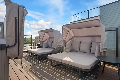 a picture of a book and a white bed