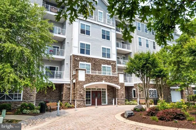 a front view of a building with street view