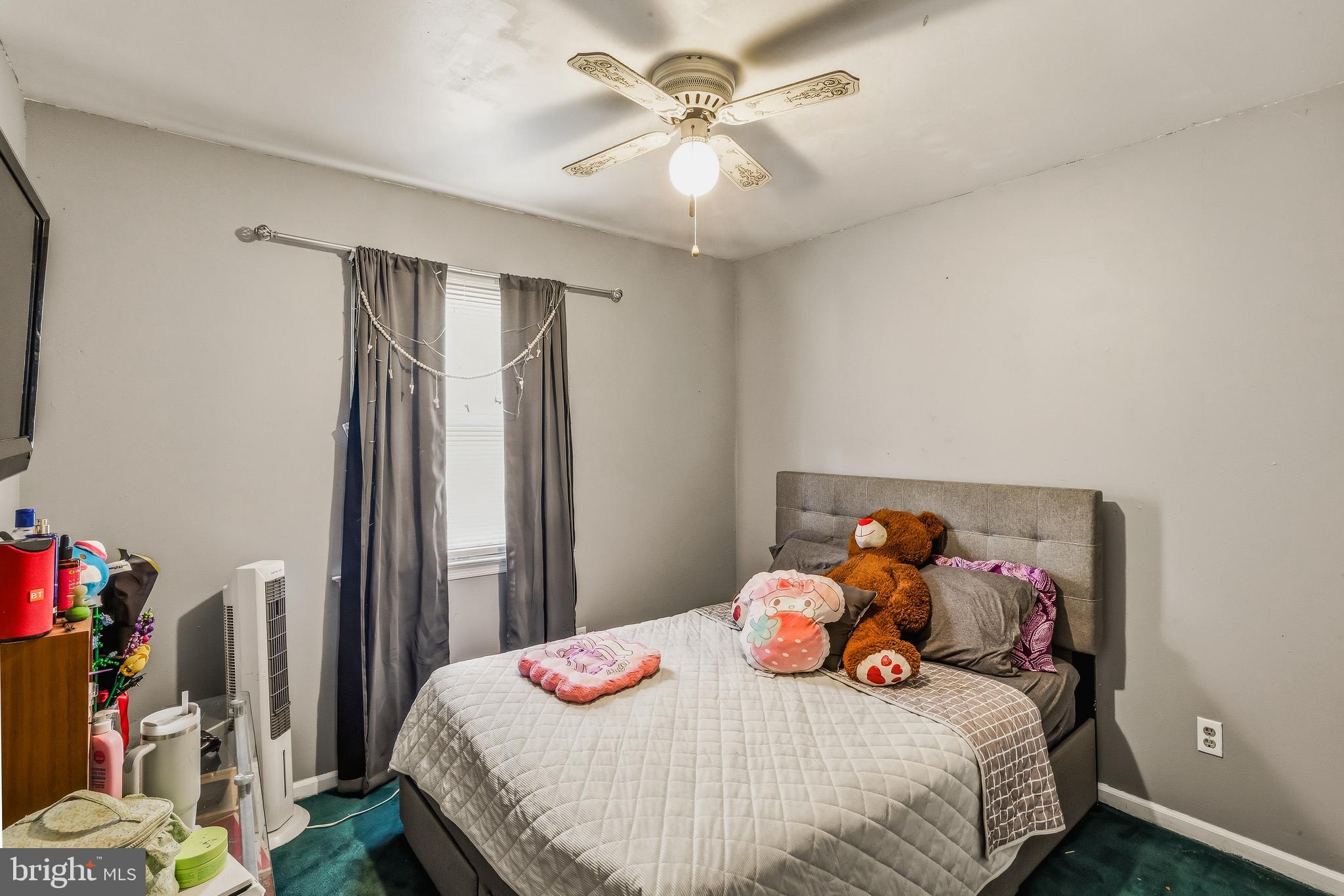7 Matro Avenue Sicklerville, NJ 08081 - Photo 10 of 21 a bedroom with a bed and a chandelier