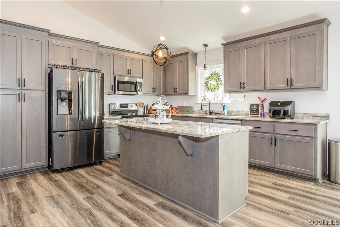 14700 Gatewood Road Dewitt, VA 23840 - Photo 5 of 23 a kitchen with a sink refrigerator and cabinets