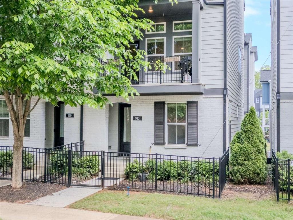 915 Katie Kerr Drive Decatur, GA 30030 - Photo 2 of 30 front view of a house with a garden