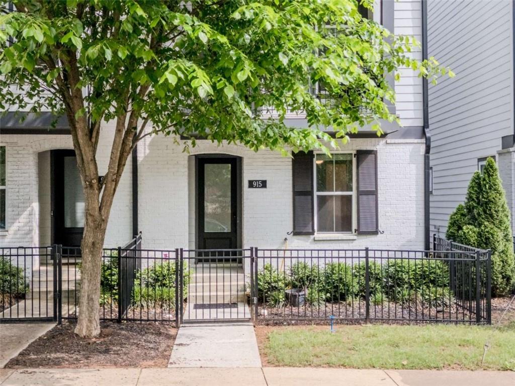 915 Katie Kerr Drive Decatur, GA 30030 - Photo 3 of 30 front view of a house with a tree