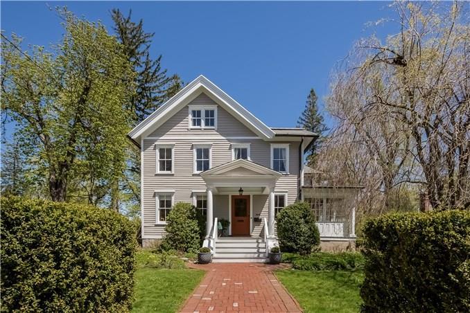 104 Main Street Ridgefield, CT 06877 - Photo 1 of 1 a front view of a house with garden