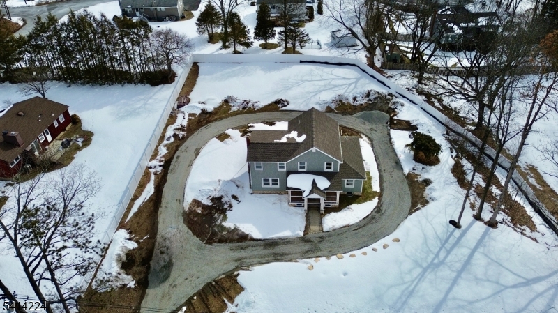 5612 Berkshire Valley Road Oak Ridge, NJ 07438 - Photo 18 of 19 a view of couches and dinning table and chairs in patio