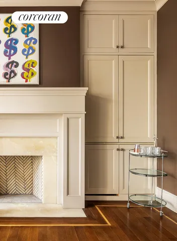 a white refrigerator freezer and a dishwasher with wooden floor