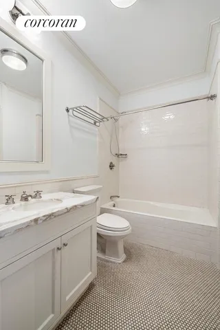 a view of a livingroom with furniture and hardwood floor