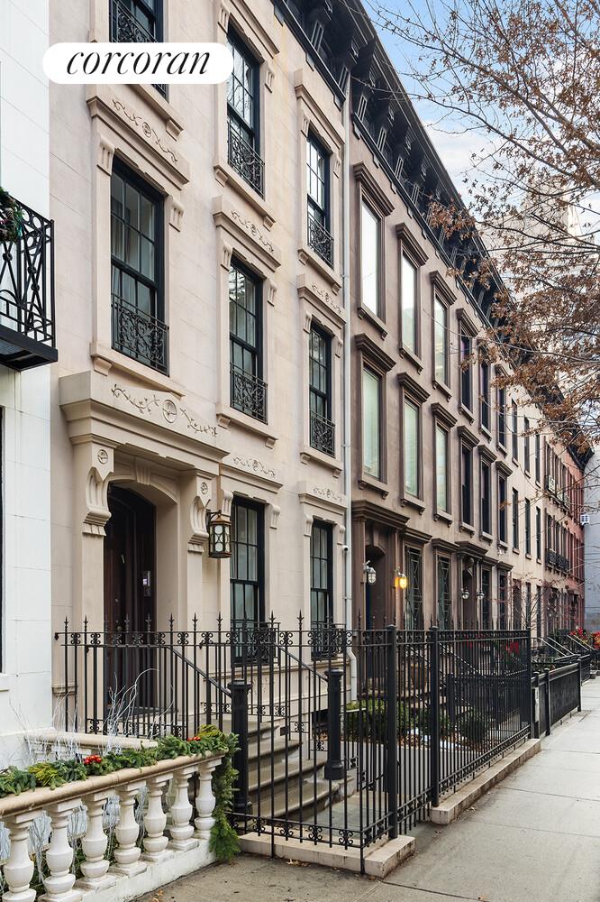 435 East 87th Street Manhattan, NY 10128 - Photo 2 of 36 a front view of a building with a glass door