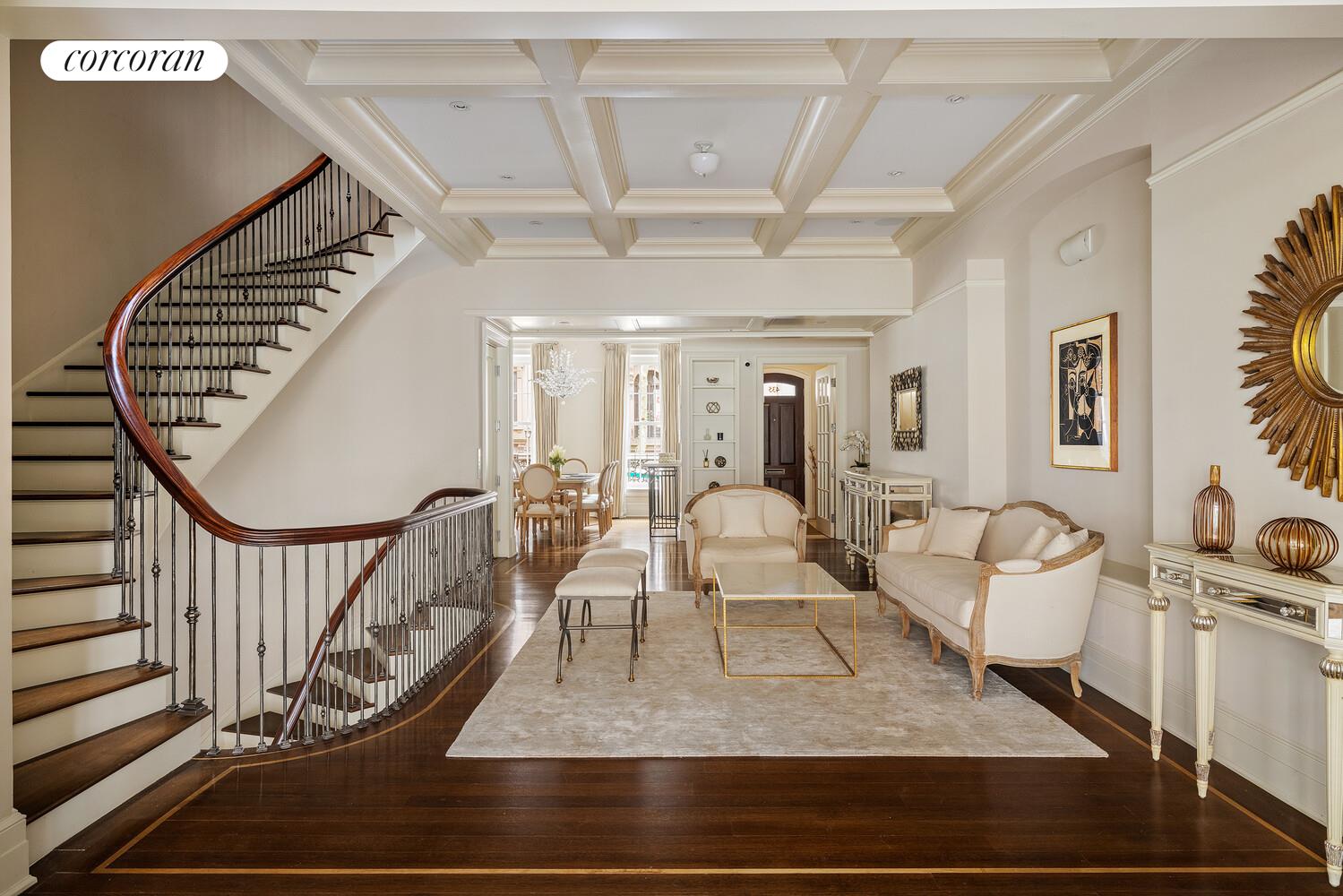 435 East 87th Street Manhattan, NY 10128 - Photo 5 of 36 a view of an entryway with wooden floor