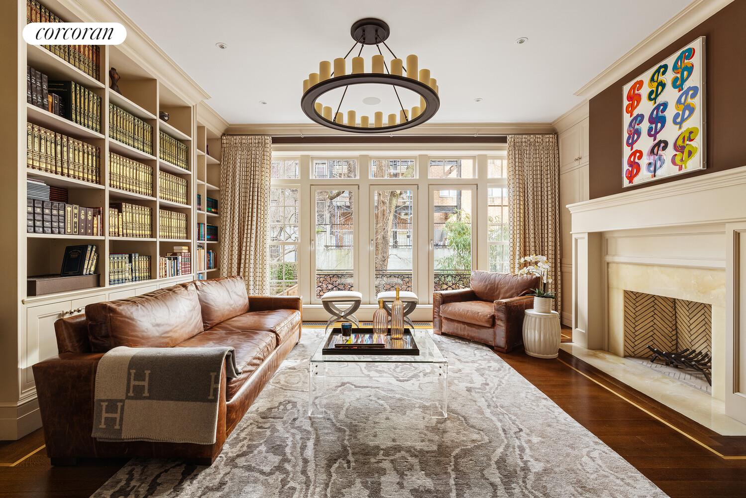 435 East 87th Street Manhattan, NY 10128 - Photo 8 of 36 a living room with furniture and a large window