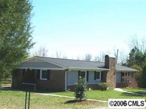 4704 Benfield Road Gastonia, NC 28056 - Photo 1 of 3 a front view of a house with a yard