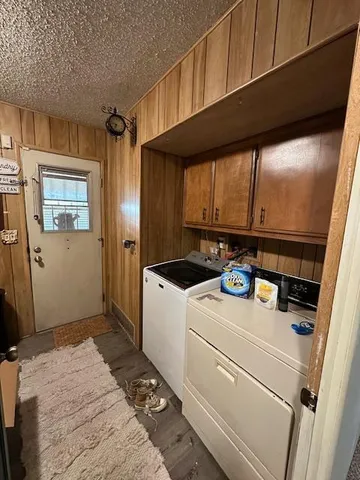a view of a hallway with seating area
