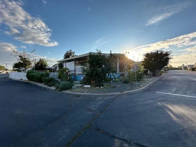a kitchen with sink cabinets and appliances