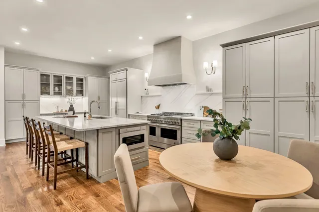 a kitchen with a sink and a refrigerator