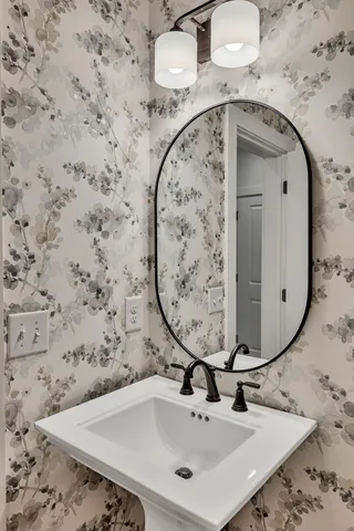 a view of a hallway with a chandelier