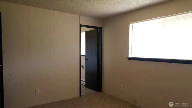 a view of a small space with a window