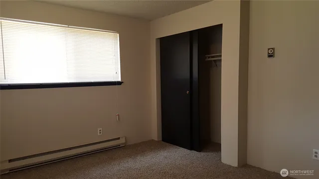 an empty room with window