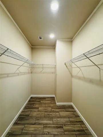 a view of a room with racks on the wall