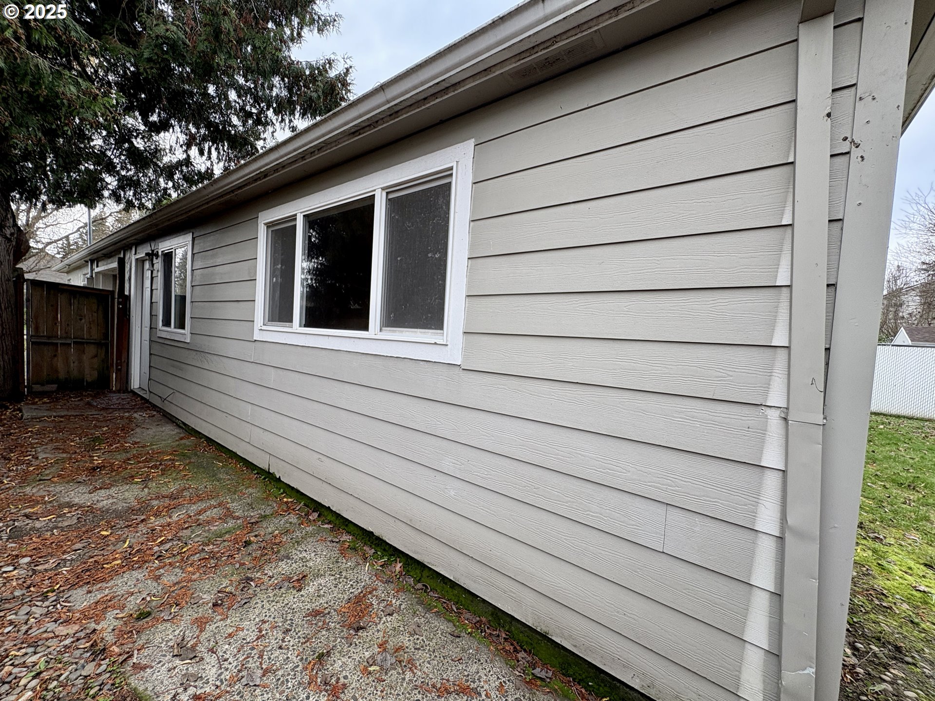 12305 Southwest 7th Street Beaverton, OR 97005 - Photo 19 of 23 a side view of a house