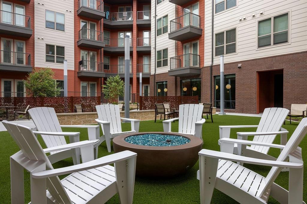 930 Ridgeview Drive, Unit 1262 Allen, TX 75013 - Photo 15 of 28 a view of an chairs and a table in the patio