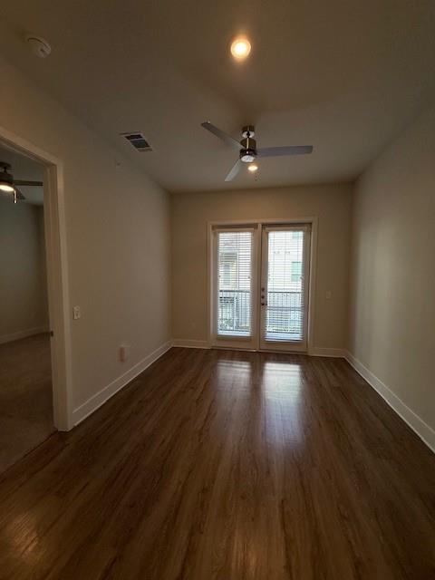 930 Ridgeview Drive, Unit 1262 Allen, TX 75013 - Photo 23 of 28 a view of an empty room with wooden floor and a window