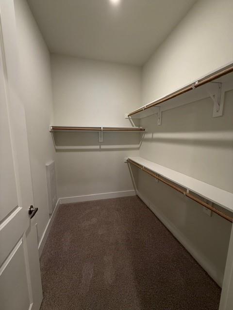 930 Ridgeview Drive, Unit 1262 Allen, TX 75013 - Photo 25 of 28 a view of a room with racks on the wall