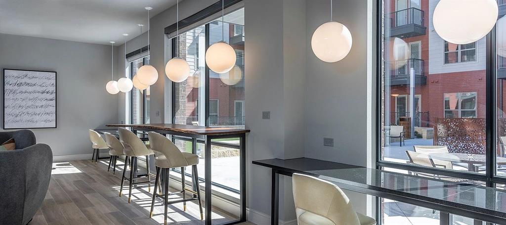 930 Ridgeview Drive, Unit 1262 Allen, TX 75013 - Photo 5 of 28 a view of a dining room with furniture and a large window