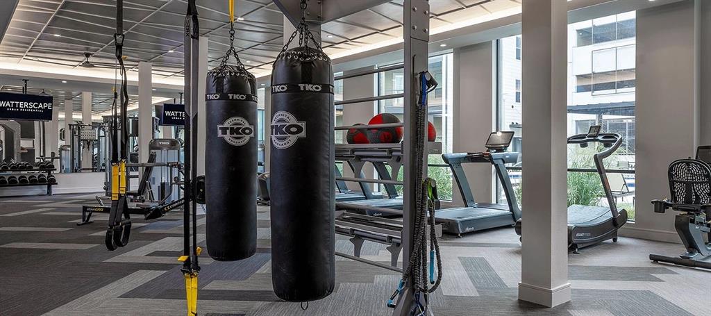 930 Ridgeview Drive, Unit 1262 Allen, TX 75013 - Photo 9 of 28 a view of a room with gym equipment