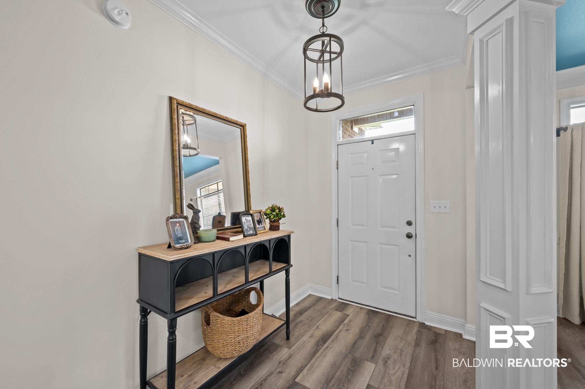 9837 Harmony Ridge Drive Semmes, AL 36575 - Photo 4 of 29 Entryway with dark wood-style floors, baseboards, and ornamental molding