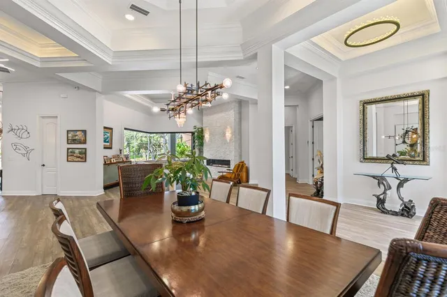 an aerial view of a house with outdoor space and lake view
