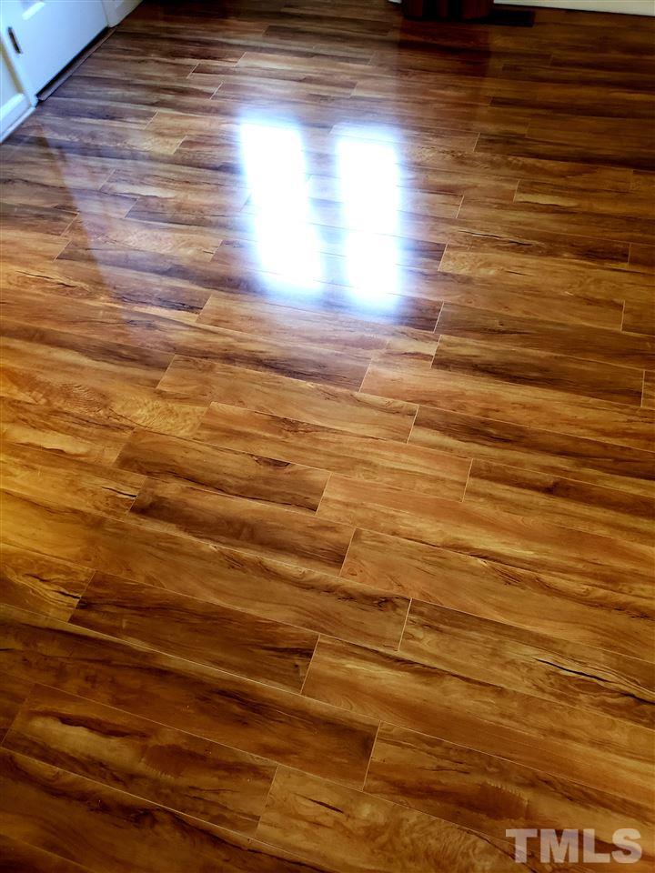1401 Governors Court Raleigh, NC 27604 - Photo 27 of 30 Gorgeous new flooring! Highest end composite hardwood laminate, very durable!