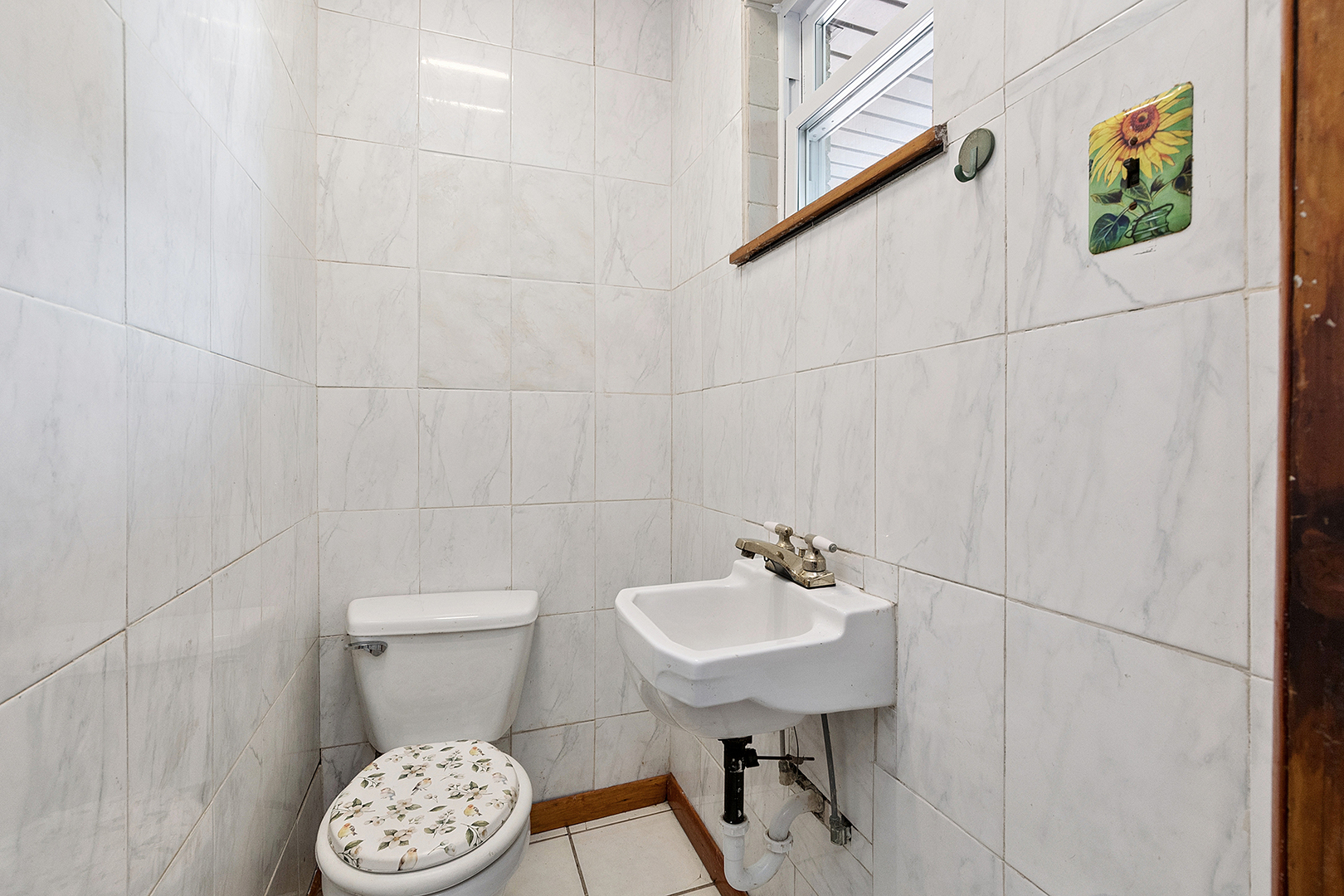 1400 Eunice Avenue Joliet, IL 60433 - Photo 13 of 34 a bathroom with a sink a toilet and a mirror