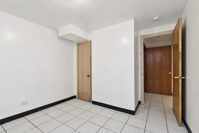 a view of a utility room with windows