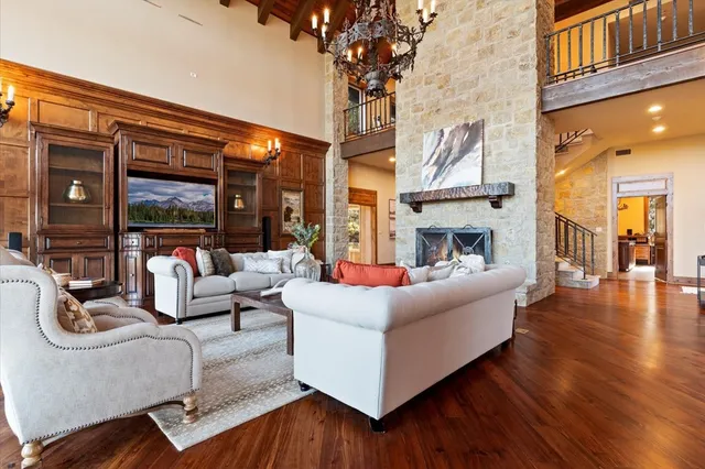 a kitchen with stainless steel appliances granite countertop wooden cabinets sink and stove top oven