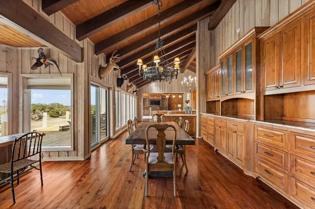 a utility room with sink dryer and washer