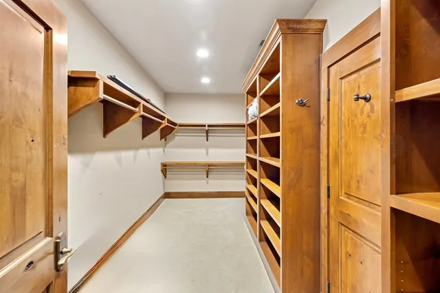 a view of a swimming pool with an outdoor seating and a yard