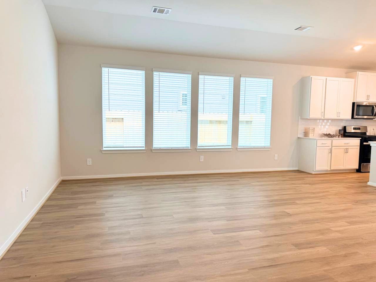 16246 Parish Pointe Court Conroe, TX 77302 - Photo 9 of 32 a view of an empty room with a window