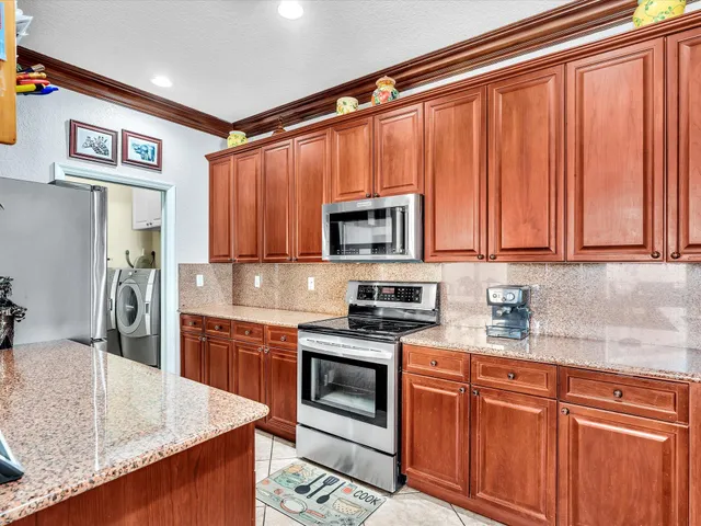 a outdoor space with a table and chairs