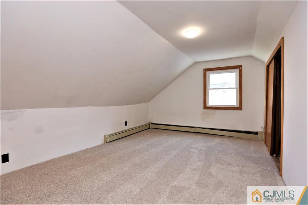 61 Ashley Road Edison, NJ 08817 - Photo 17 of 25 an empty room with windows