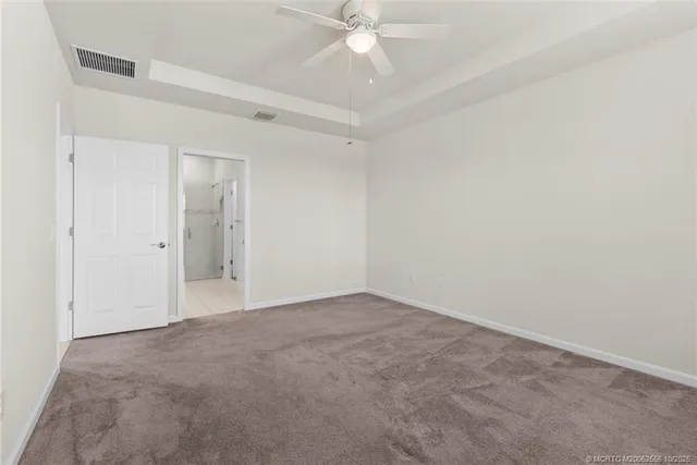 a bathroom with double sink and a mirror