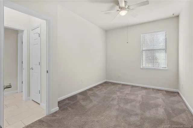 a view of a storage & utility room with a sink