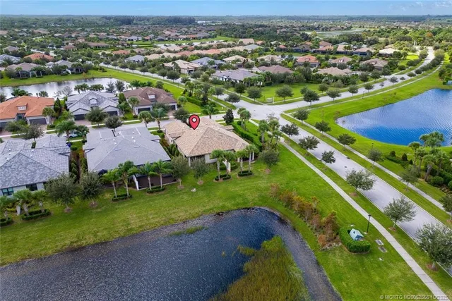 an aerial view of a houses with outdoor space