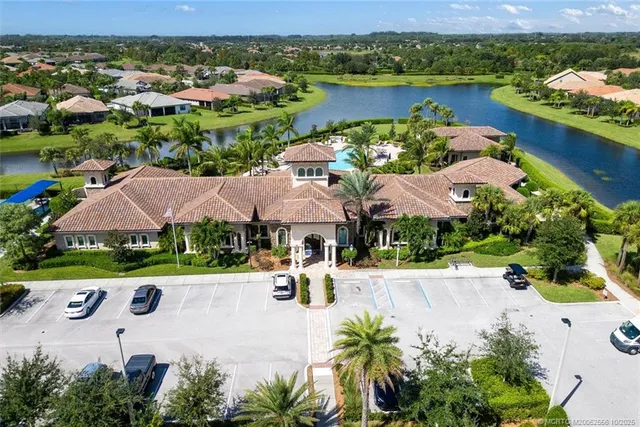 a view of a swimming pool with lounge chairs