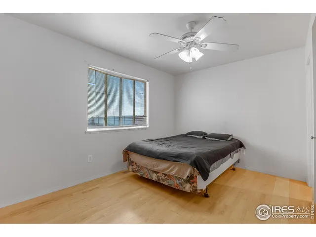 a living room with a bed