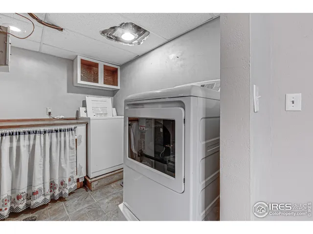 a bathroom with a sink toilet and mirror