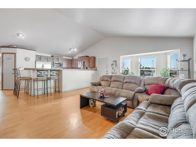 a living room with furniture and a couch