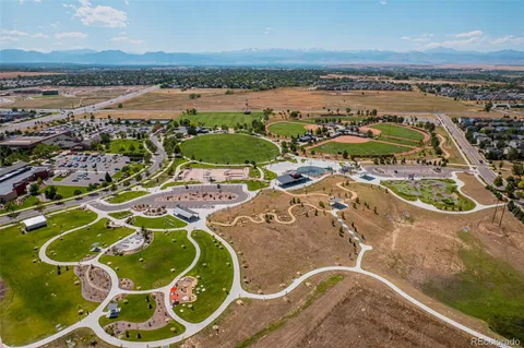 an aerial view of a swimming pool with outdoor space