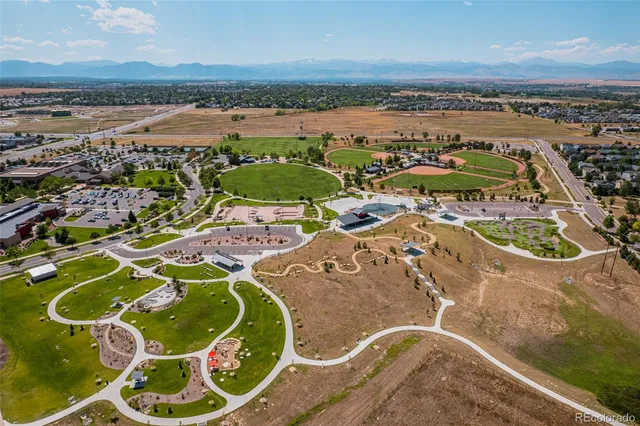 an aerial view of a swimming pool with outdoor space