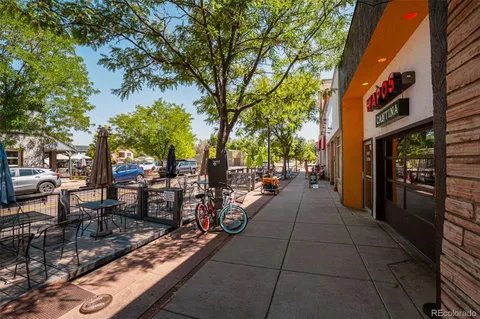a view of a pathway with a patio