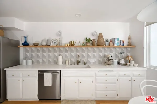 a view of cabinets and fireplace